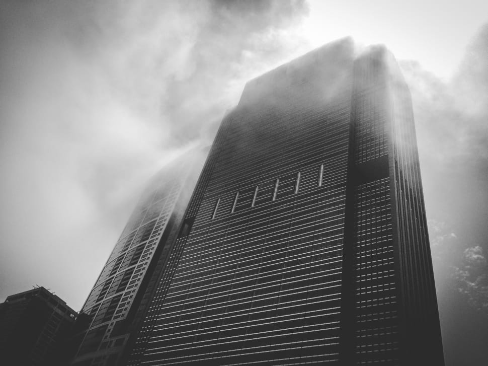 gray scale photo of high rise building preview