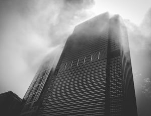 gray scale photo of high rise building thumbnail