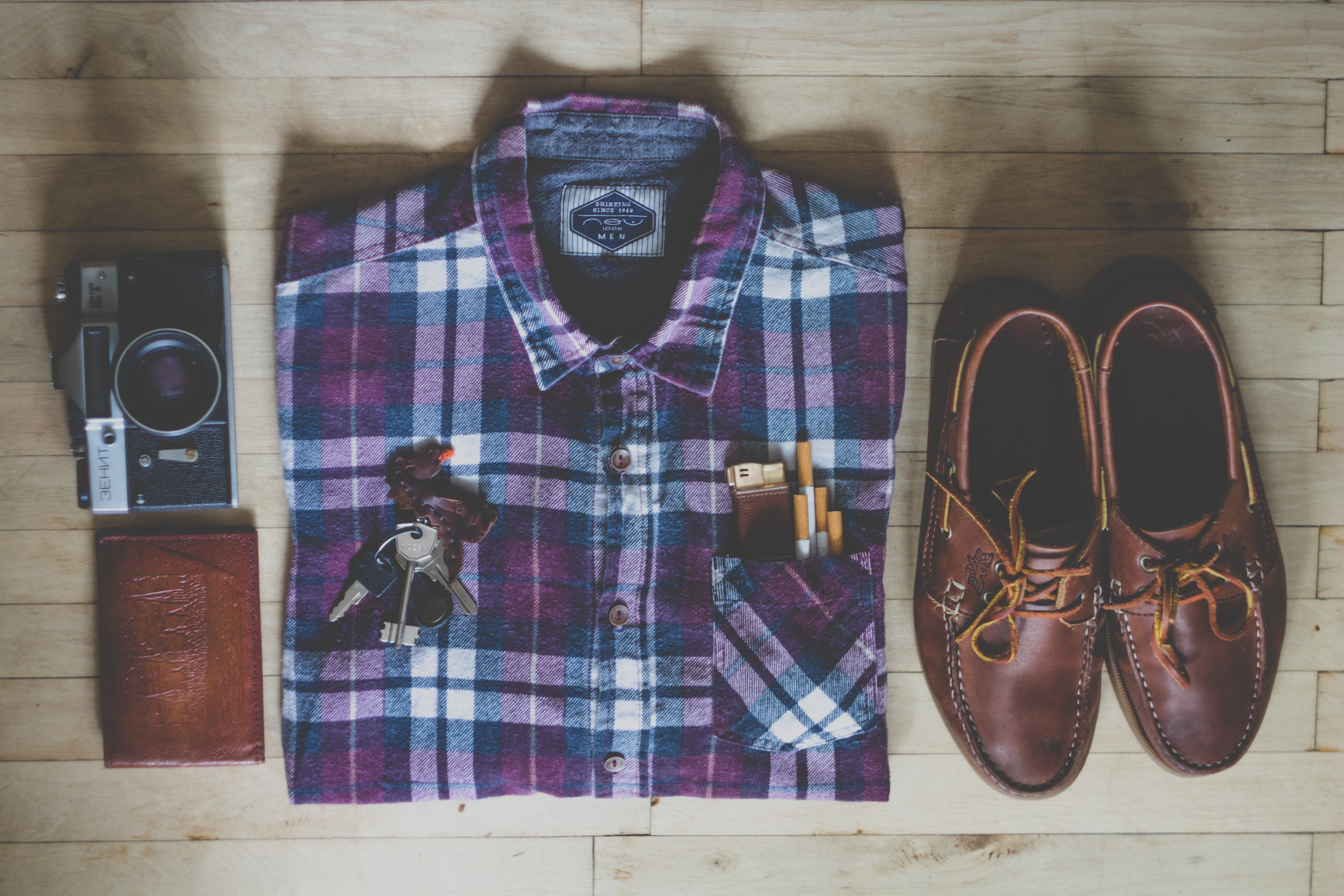 purple white and black plaid dress shirt with boat shoes