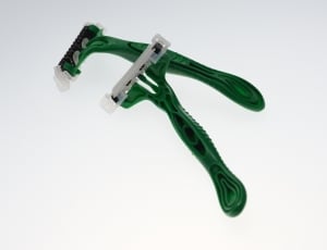 green and gray disposable shaving razor thumbnail