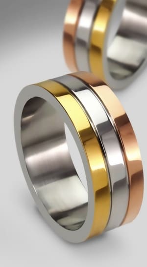 pair of gold silver and brown ring thumbnail