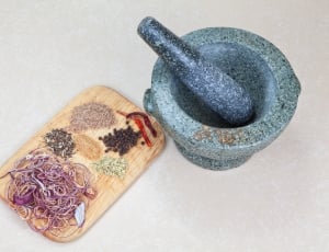 gray mortar and pestle and chopping board thumbnail