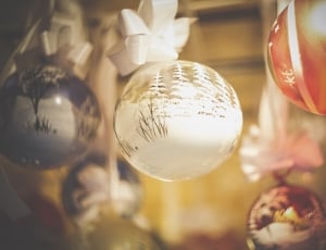 clear glass bauble shallow focus photography thumbnail