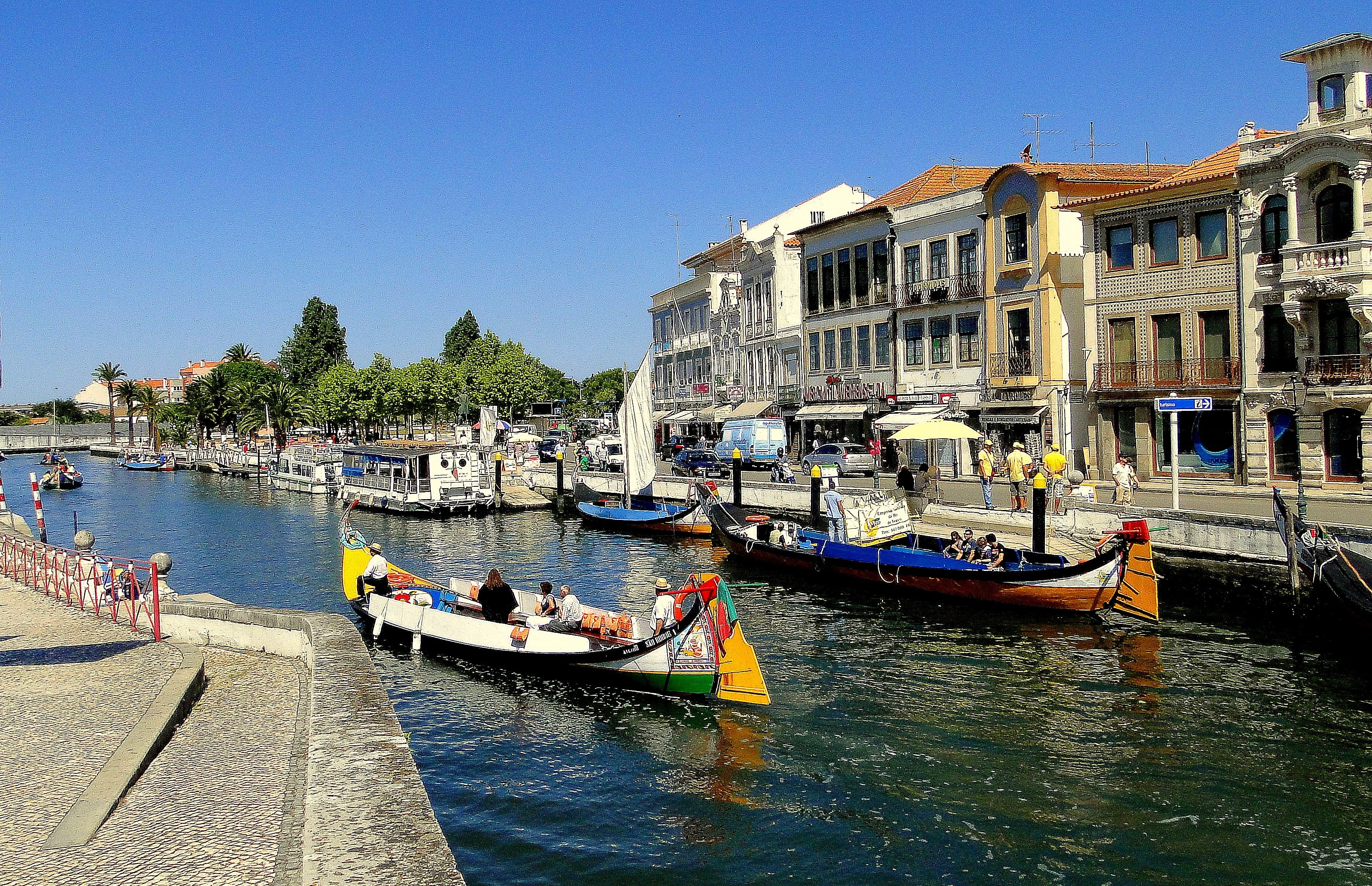 photo of two river boat near port