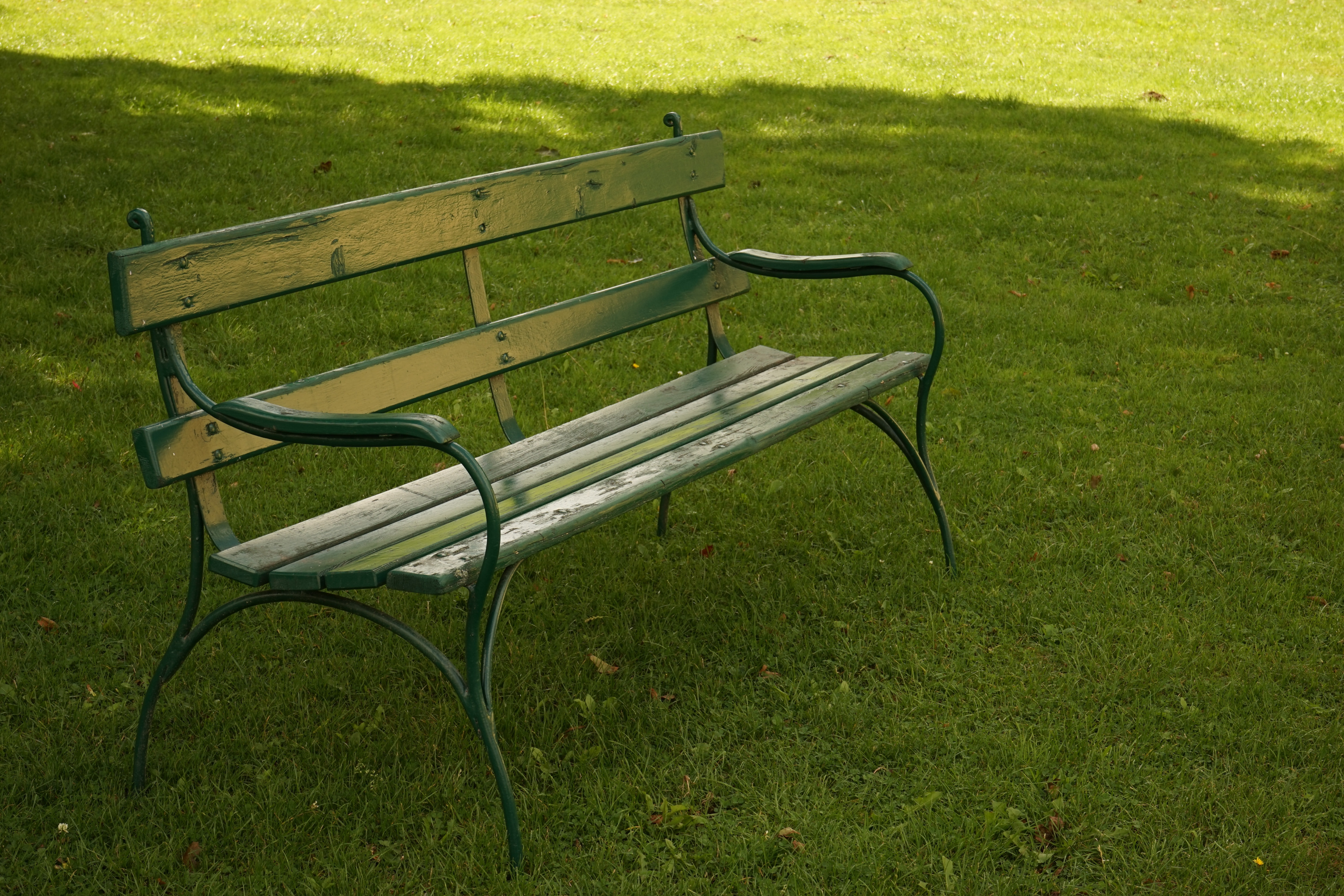 green metal frame bench