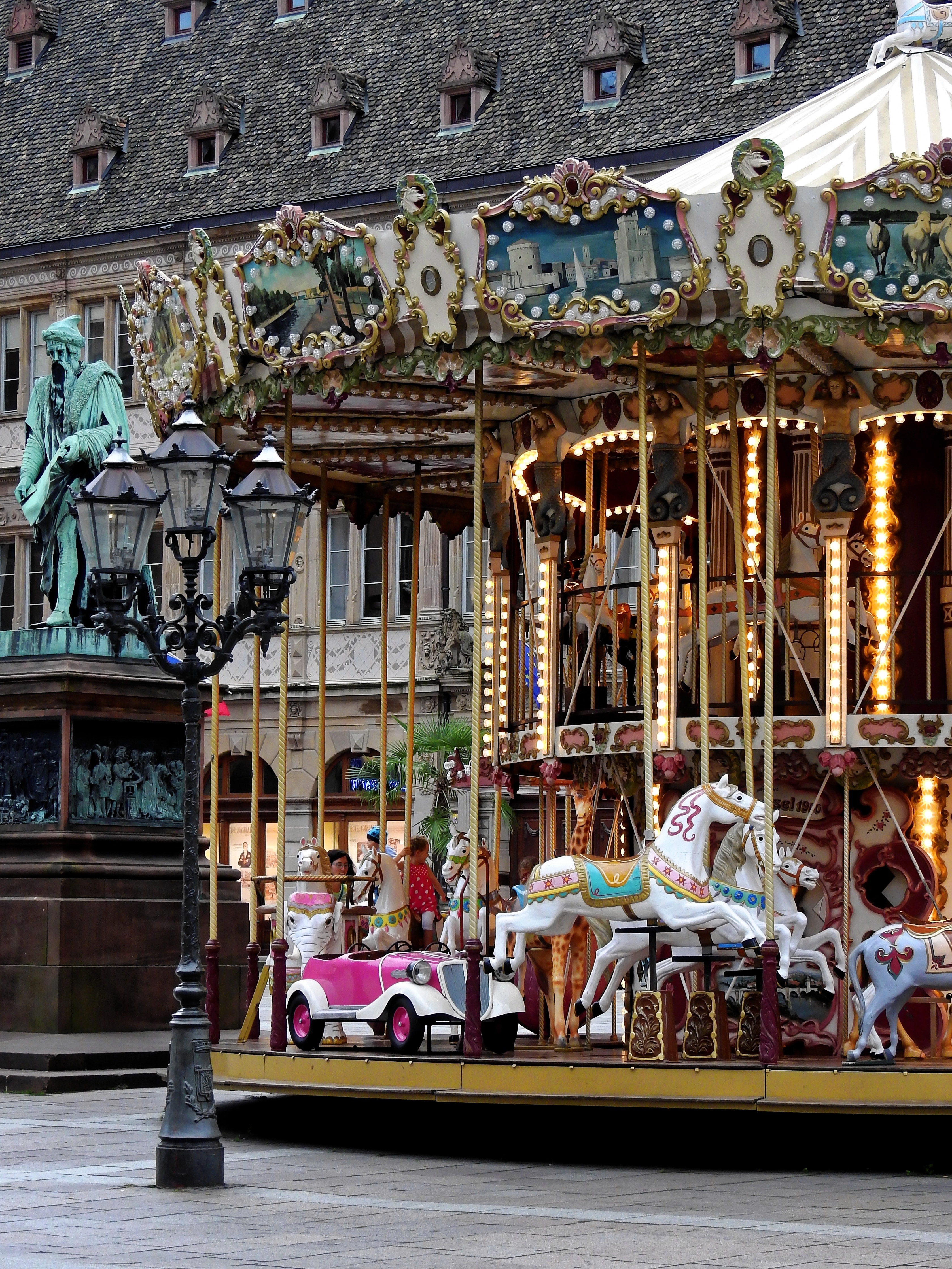 white and gold carousel
