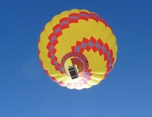 yellow, red and gray hot air balloon thumbnail