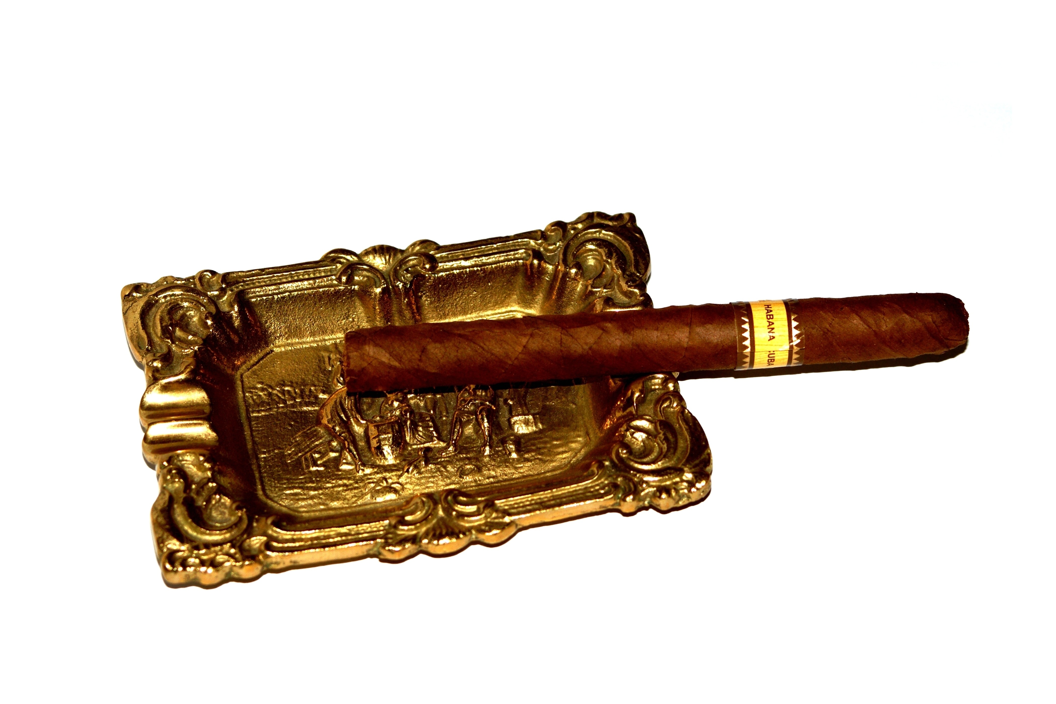 brown tobacco and brass rectangular ashtray