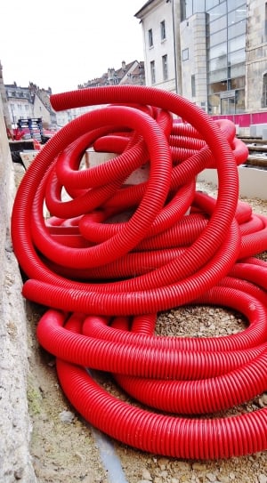 red flexible hose on ground thumbnail