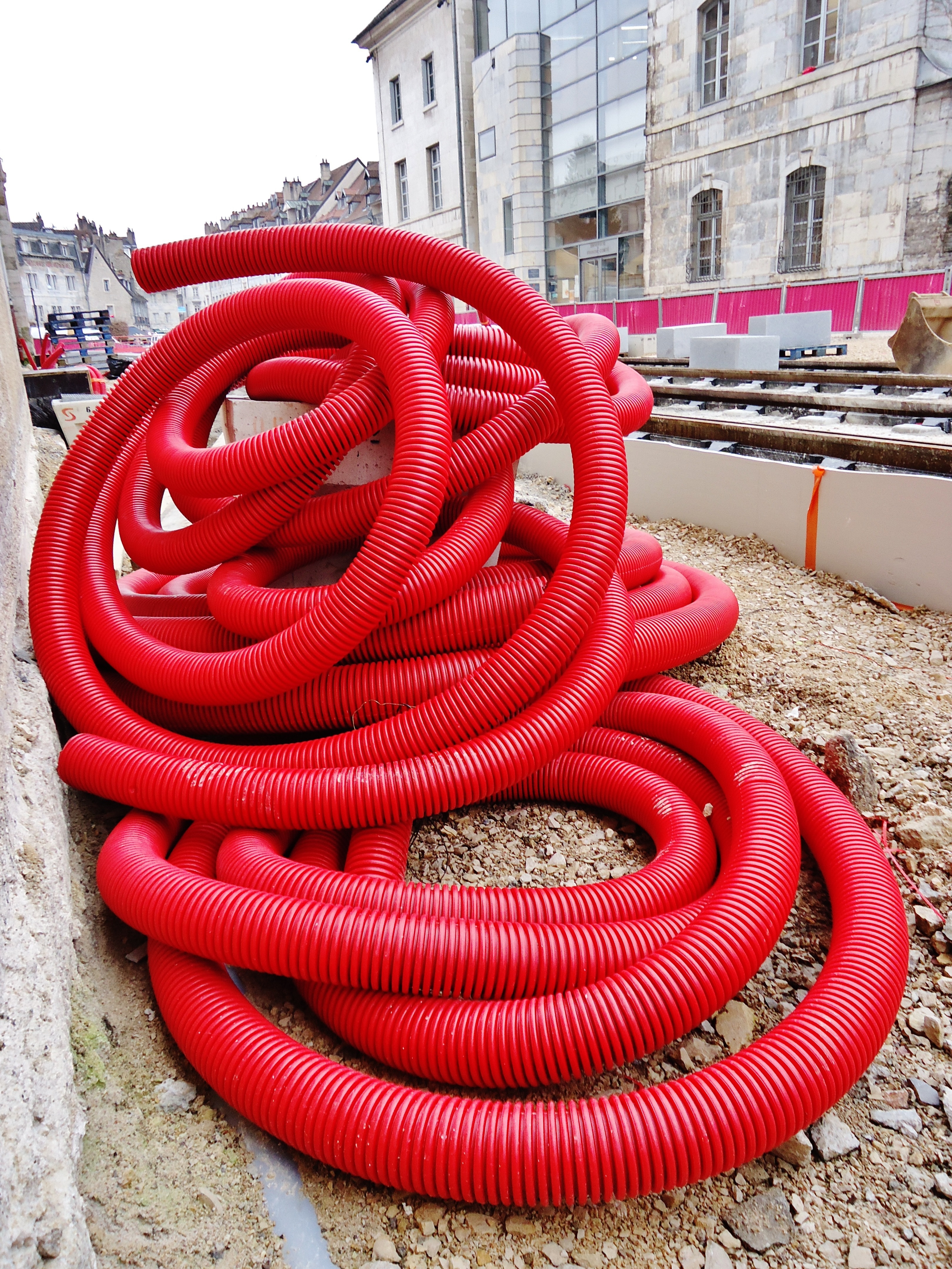 red flexible hose on ground