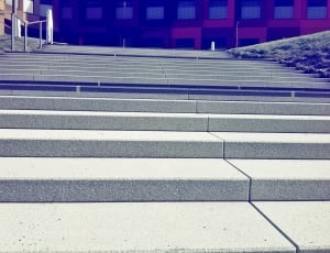 grey concrete stairs during daytime thumbnail