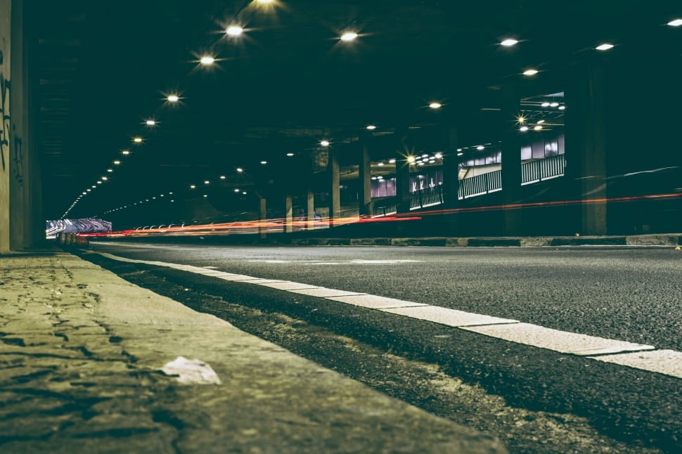 gray road beside black building architectural photography preview