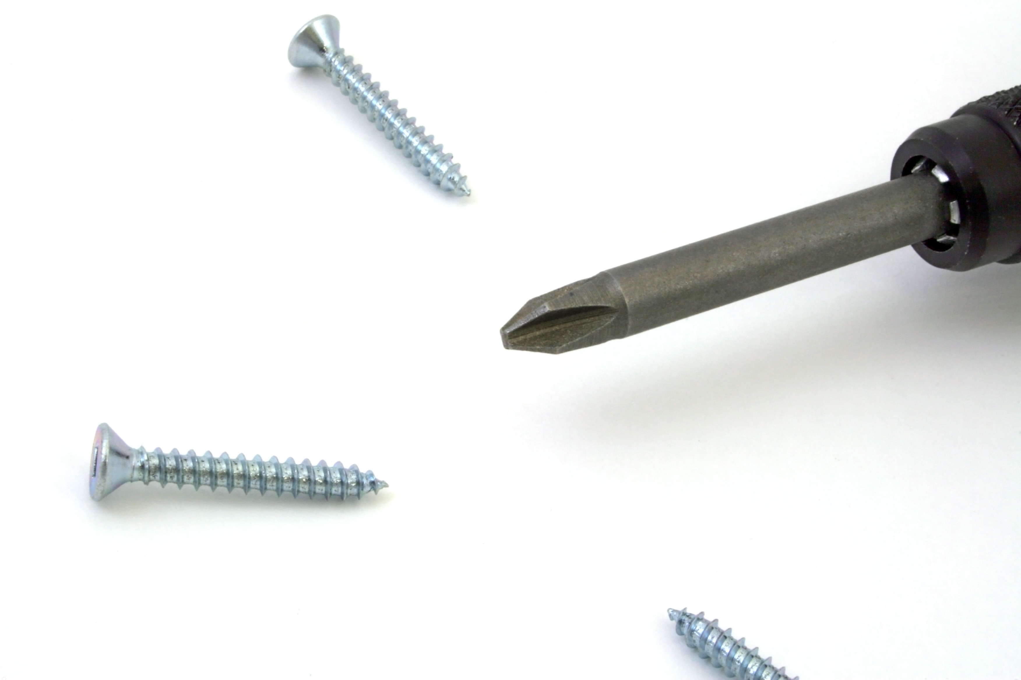 black power drill and gray metal screws