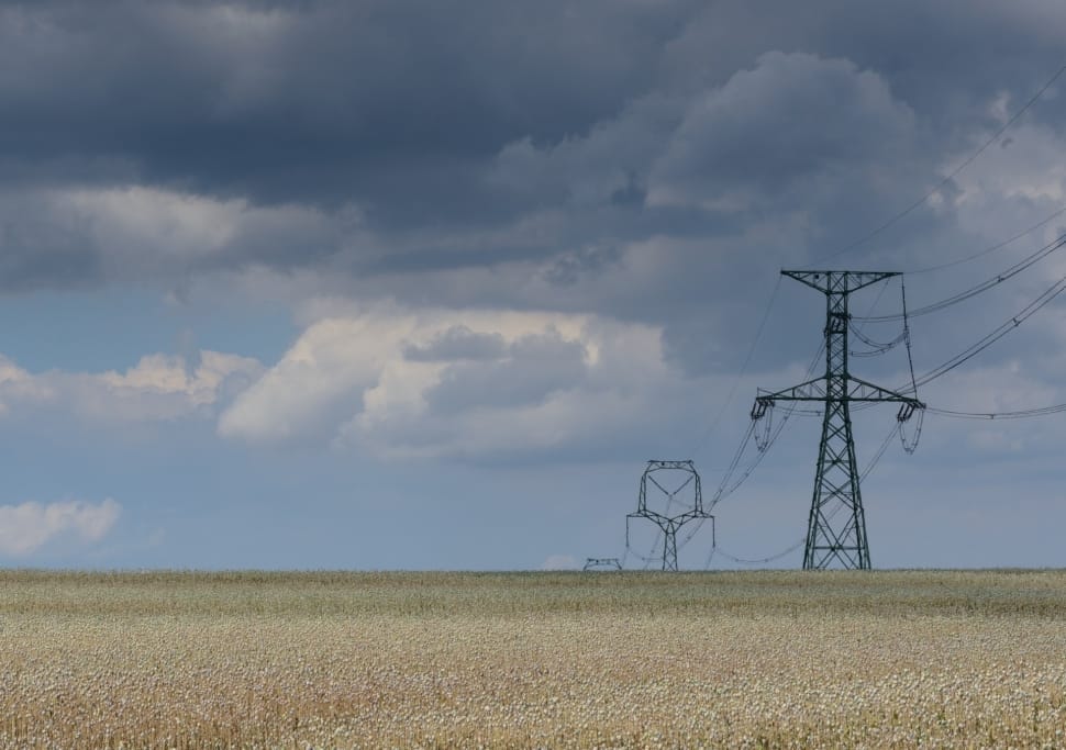 black antenna tower on the middle of wheat field preview