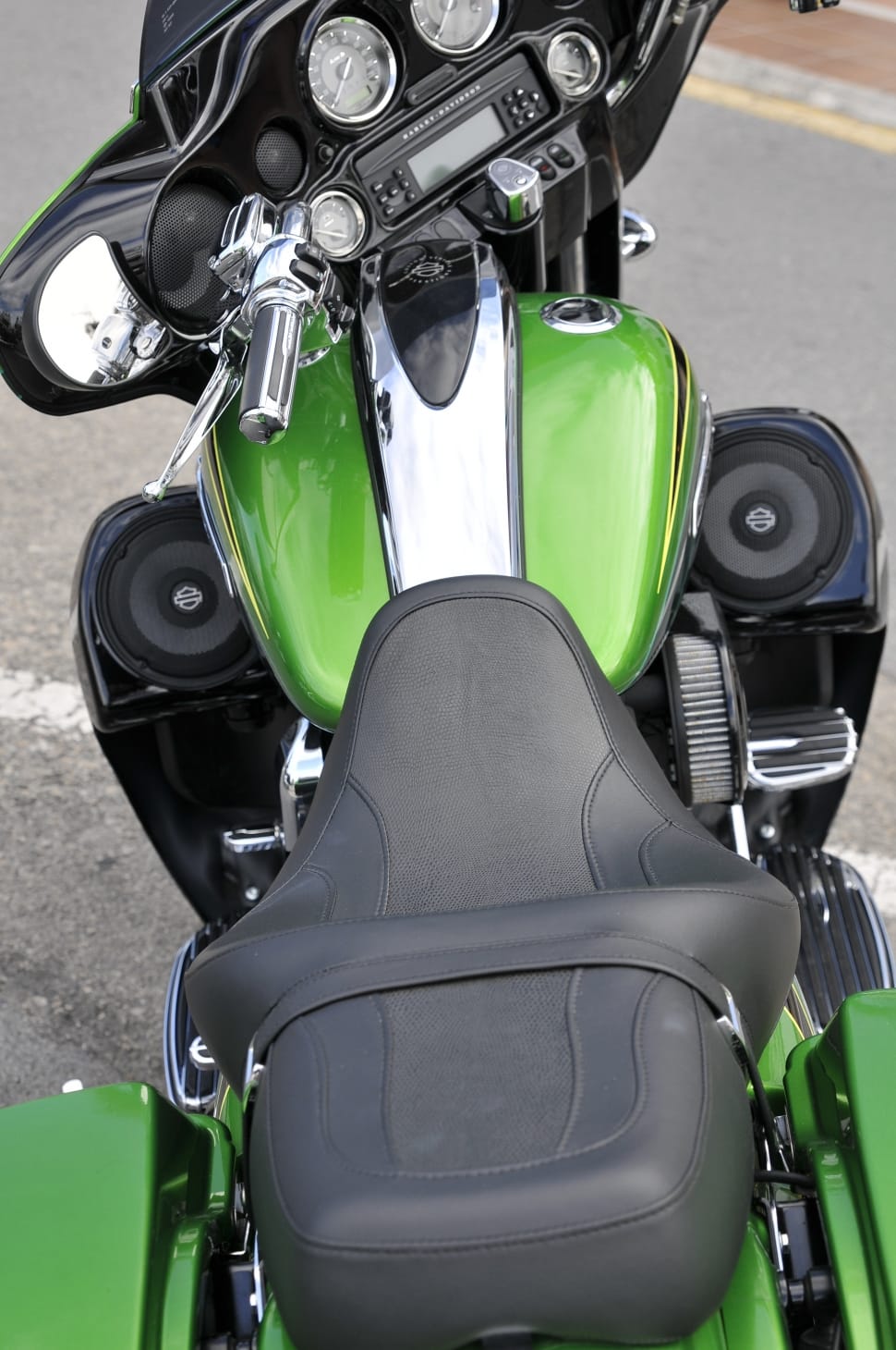 green Harley-Davidson cruiser motorcycle during daytime preview