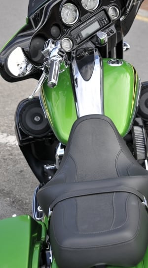green Harley-Davidson cruiser motorcycle during daytime thumbnail