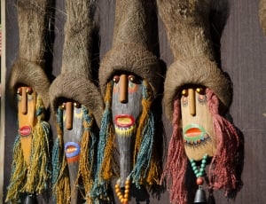 photo of five wall mounted tribal mask decors thumbnail