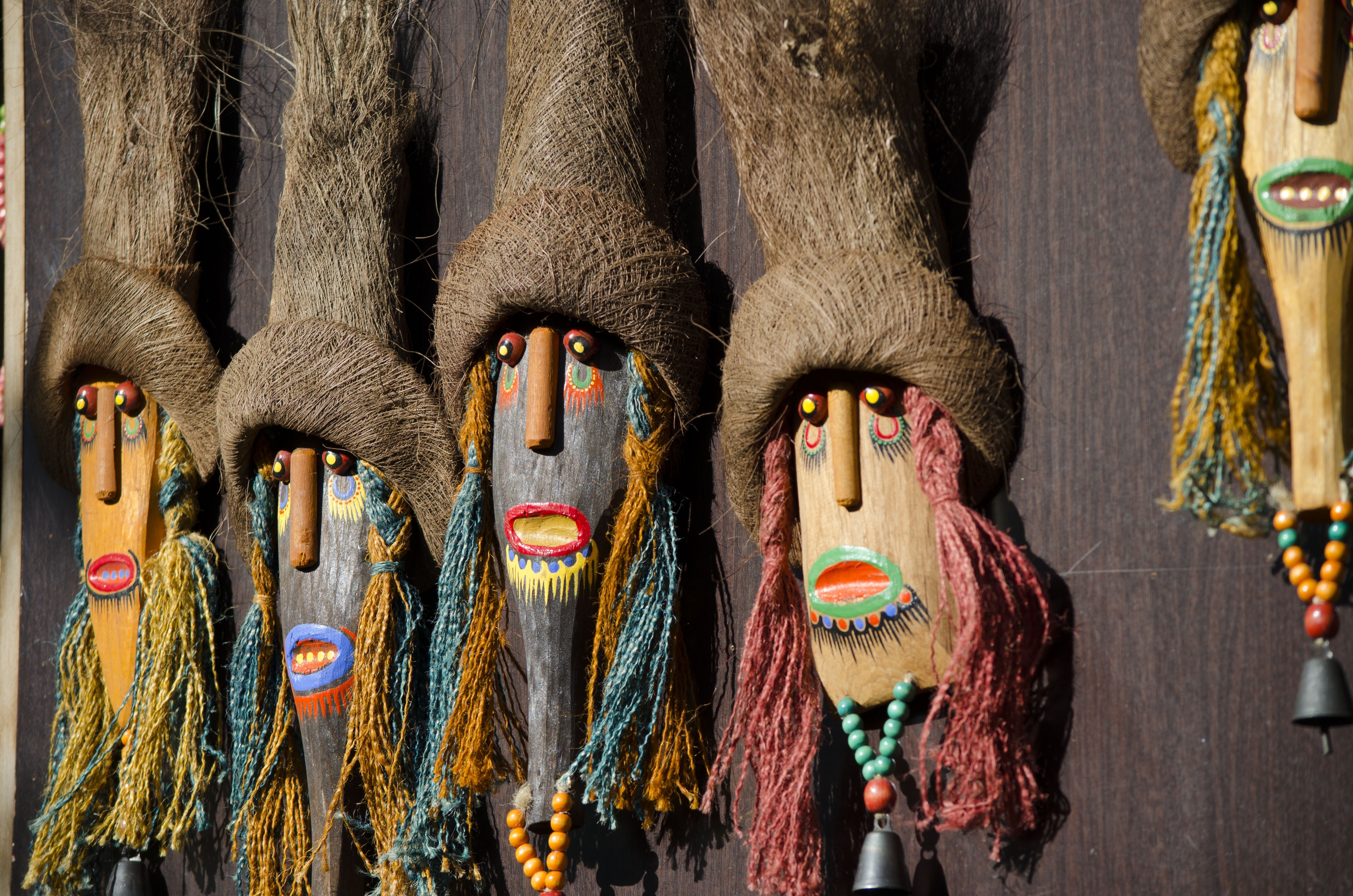 photo of five wall mounted tribal mask decors