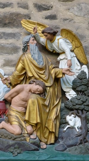 two religious men and angel figurines thumbnail