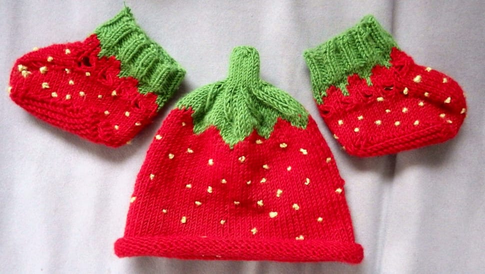 baby's red knit cap and shoes preview