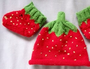 baby's red knit cap and shoes thumbnail