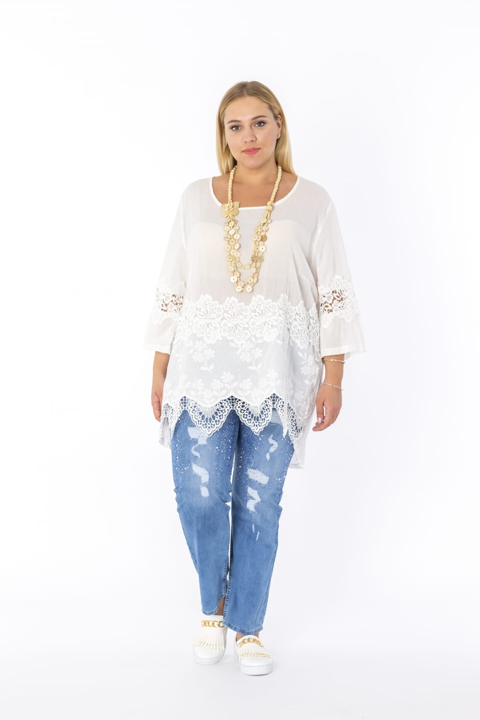 white scoop neck top and blue jeans preview