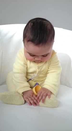 baby's yellow sleep suit thumbnail