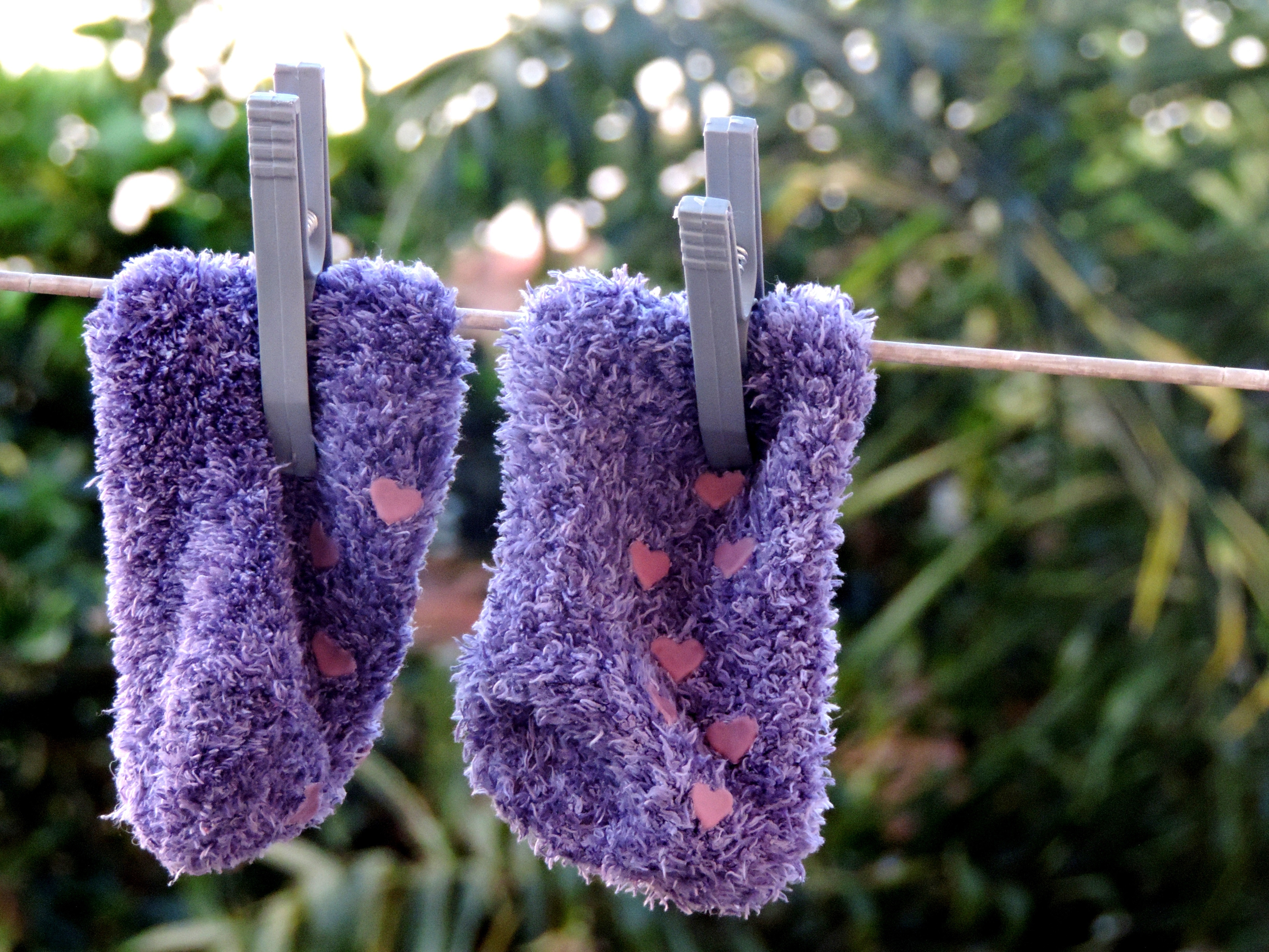 pair of purple fur socks