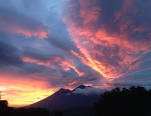 silhouette of mountain during sunset thumbnail