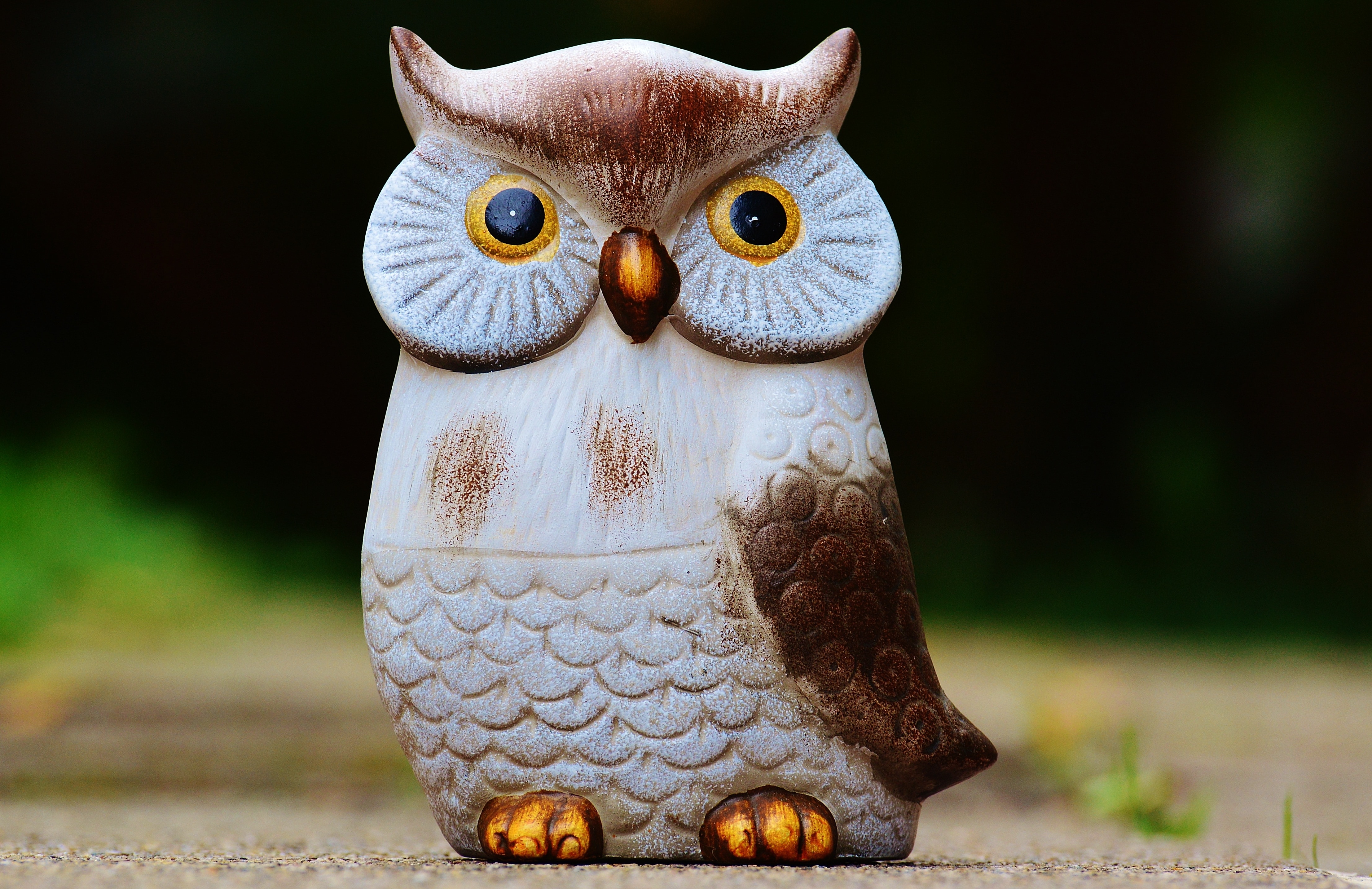 brown and white owl figurine