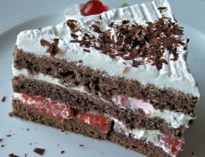 slice cake on top of white ceramic plate thumbnail