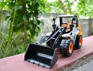 black and gray excavator toy thumbnail