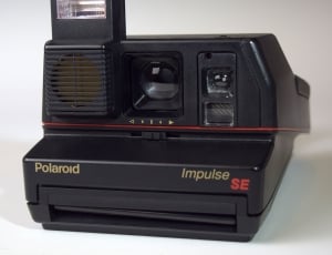 black polaroid impulse se instant camera thumbnail