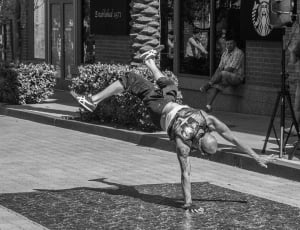 black and white photo of man about to tumbling thumbnail