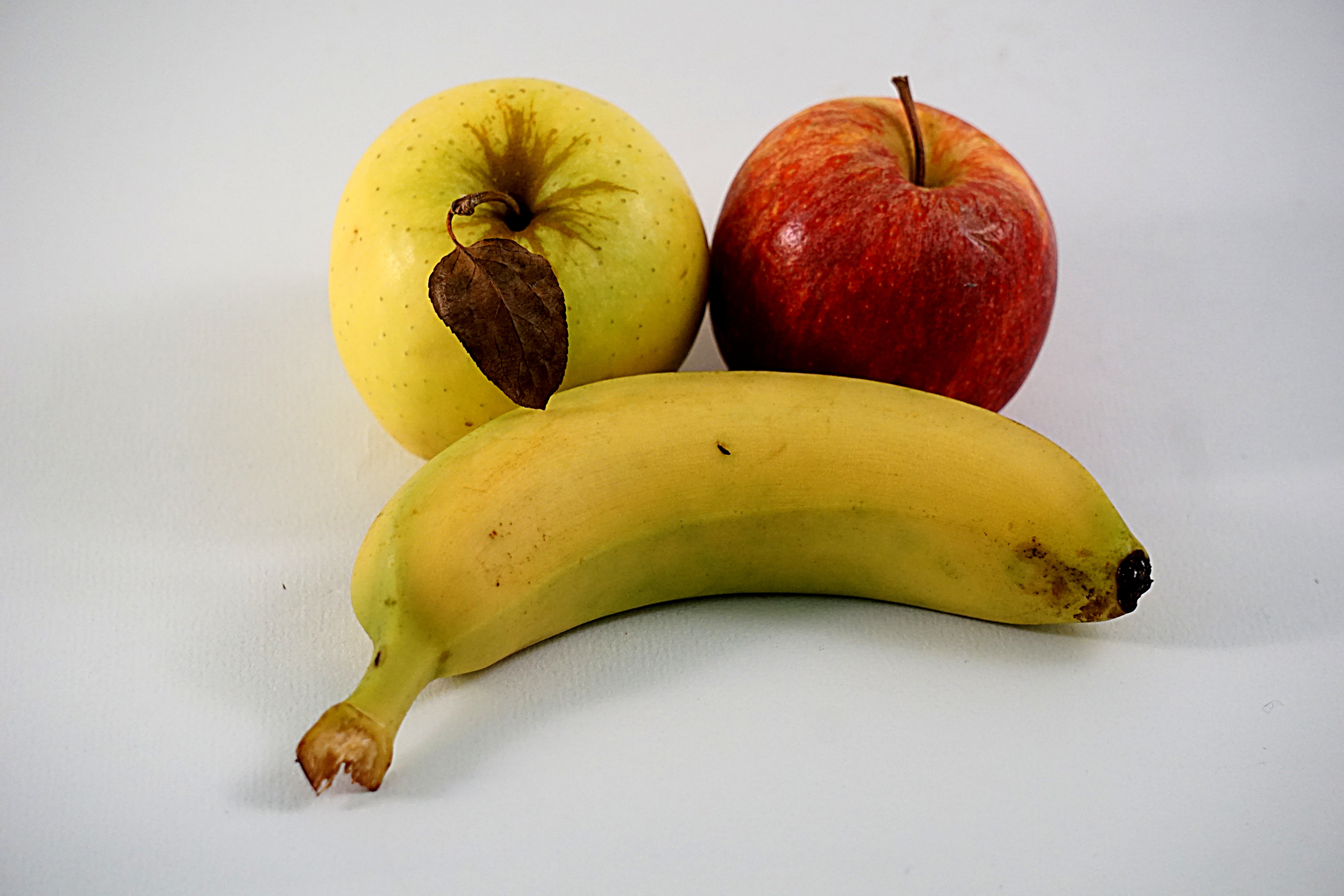 yellow banana and red apple fruit