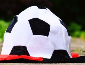 white black yewllow and red soccer ball hat thumbnail