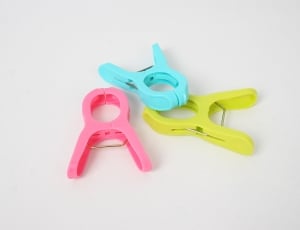 pink teal and yellow plastic clip thumbnail