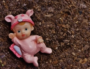 pink and brown baby figurine thumbnail