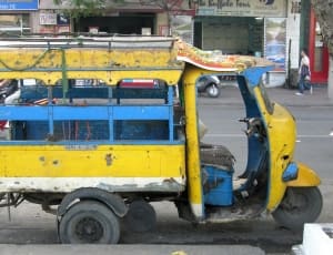yellow and blue tricycle thumbnail