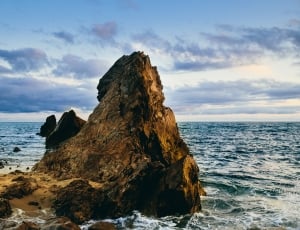 tall rock in sea thumbnail