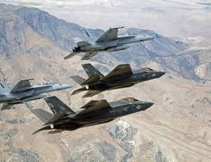 2 gray and 2 black fighter planes thumbnail