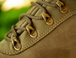 close up photo of brown leather lace shoes thumbnail