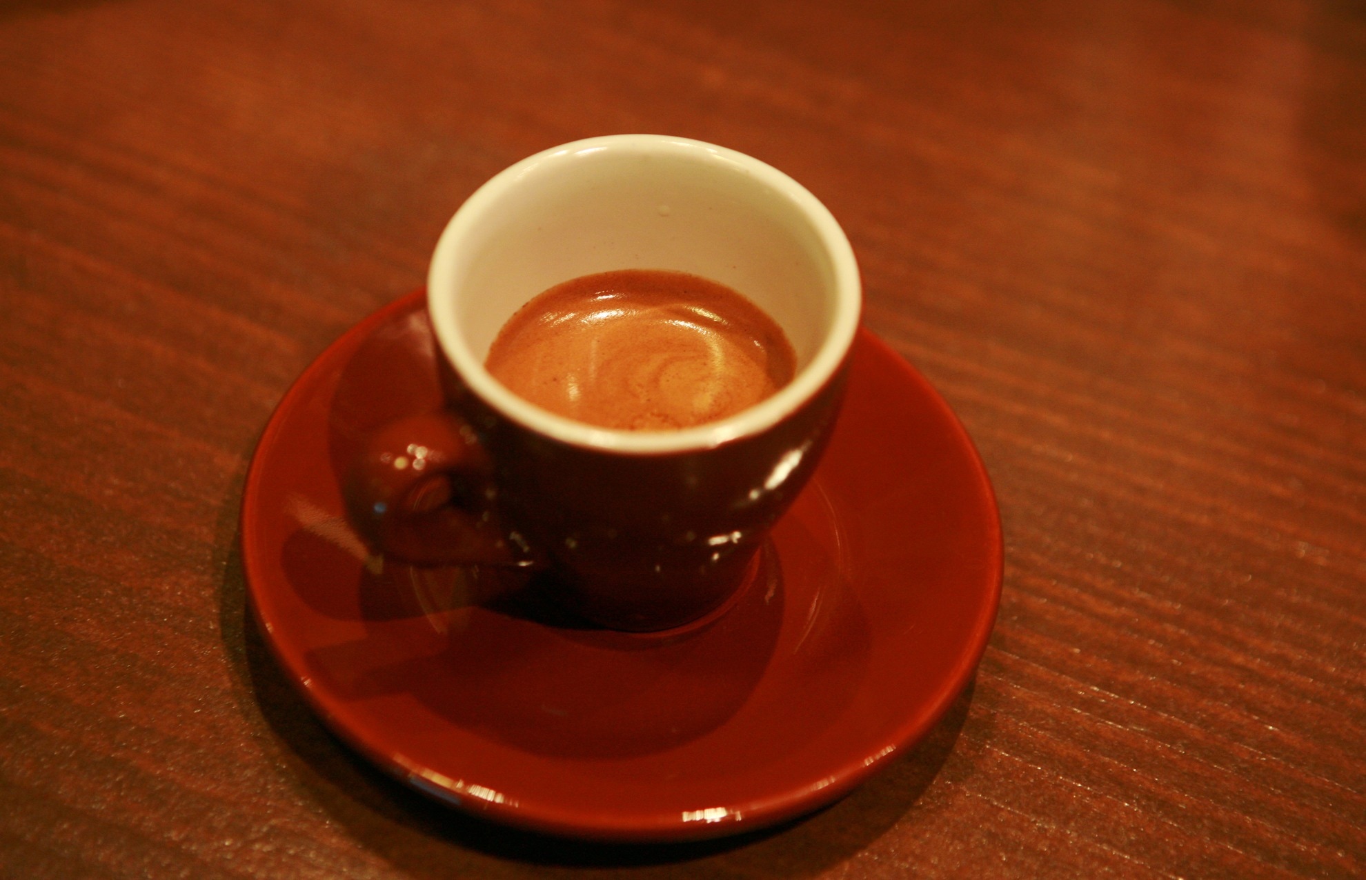 red ceramic cup