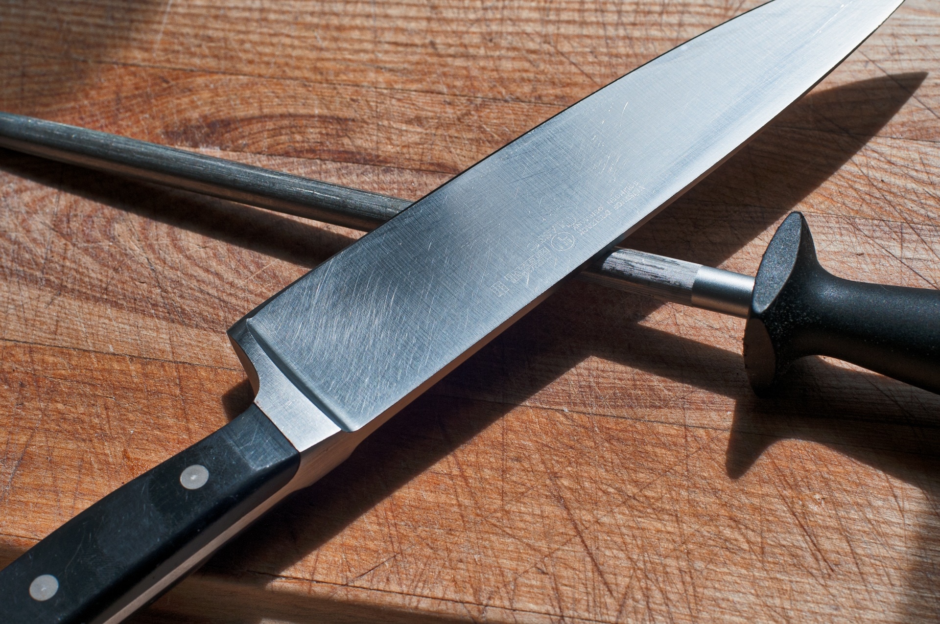 black and silver knife and sharpener set