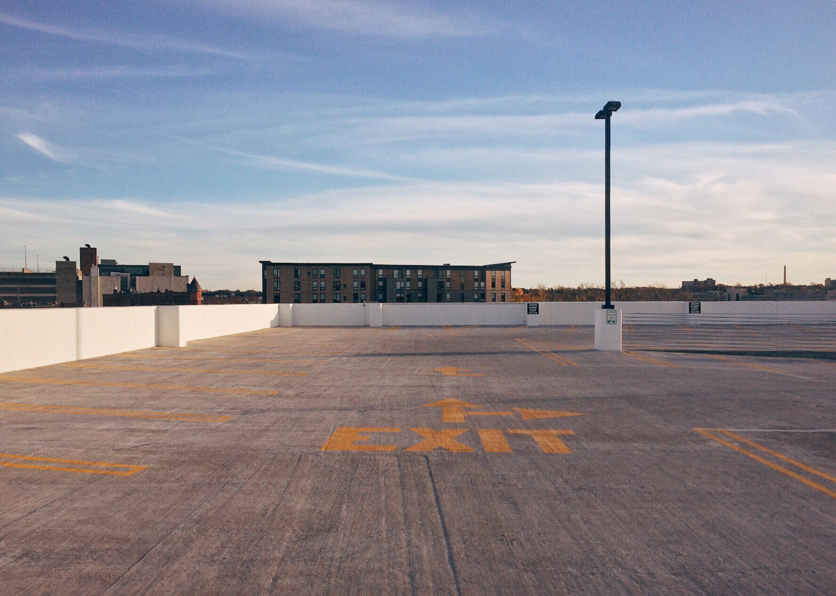 grey and orange empty parking lot