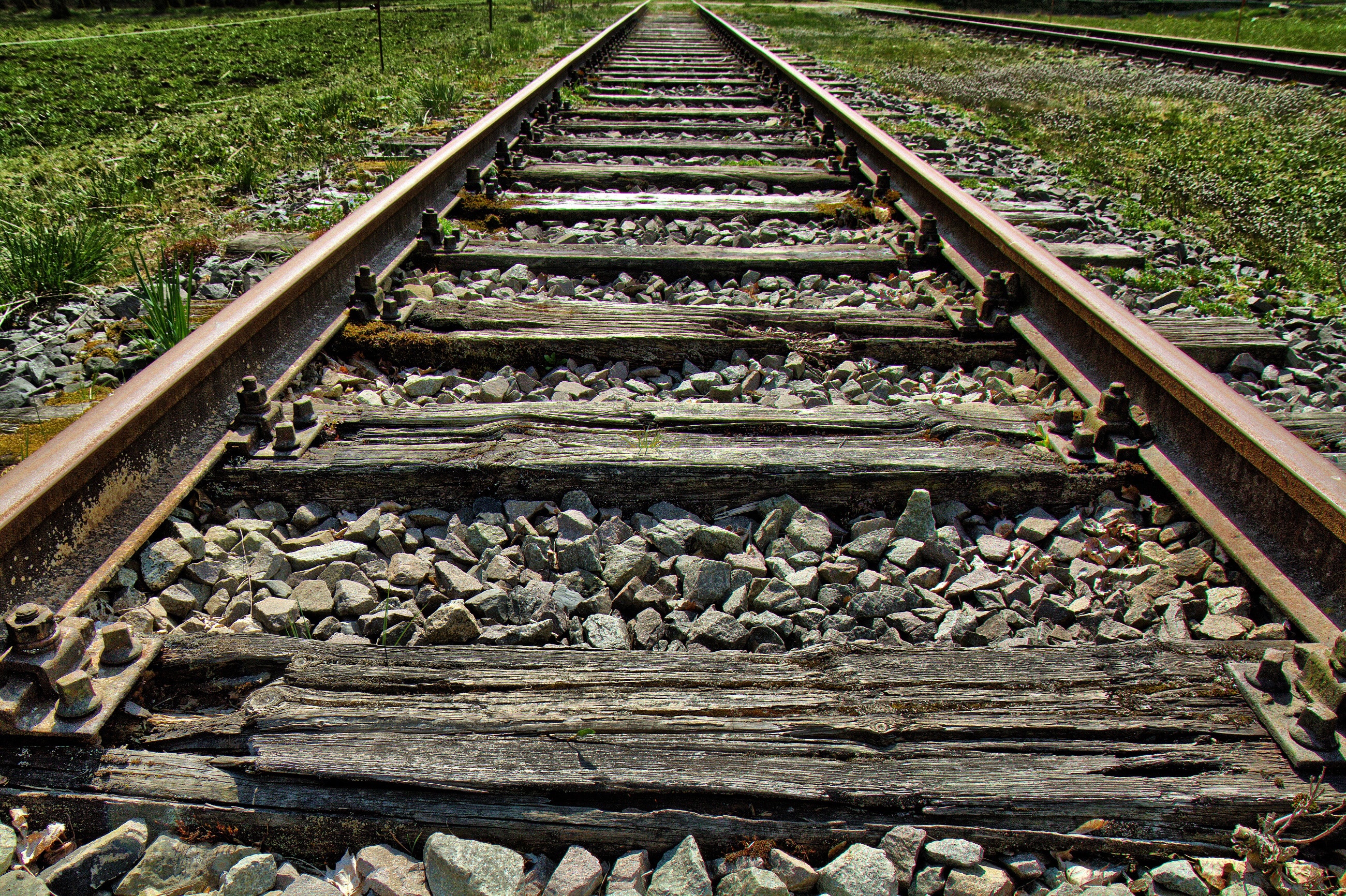 brown straight train rails