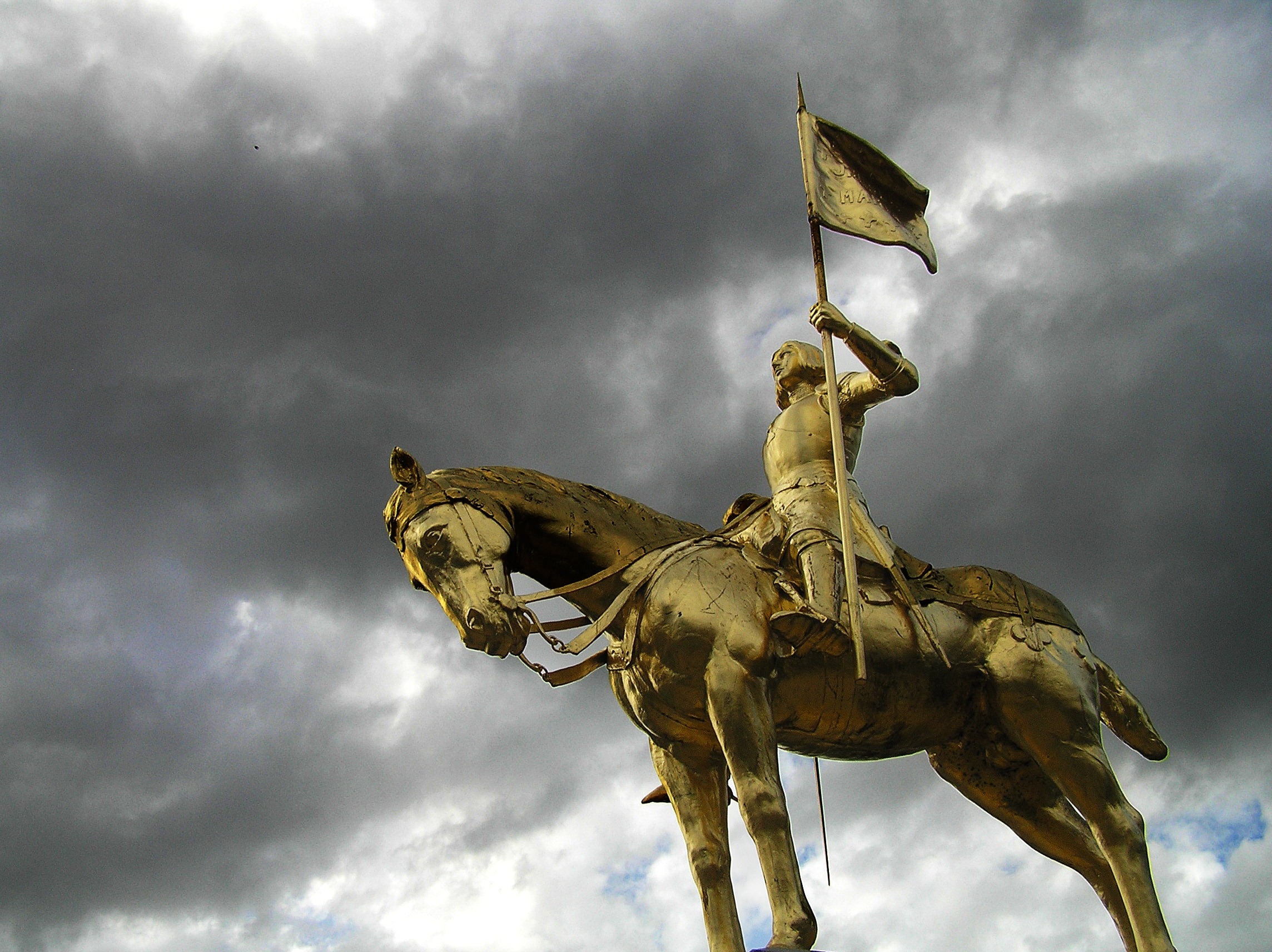 soldier on horse gold statue