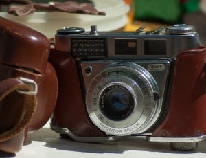 silver and brown film camera thumbnail