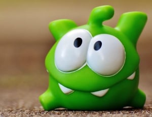 toddler's green frog toy thumbnail