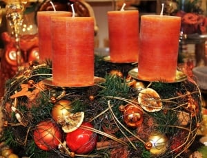 4 orange pillar candles thumbnail